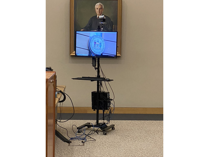 Members of the Judicial Information Center demonstrated a “cart” that has been created with audio and video conferencing equipment