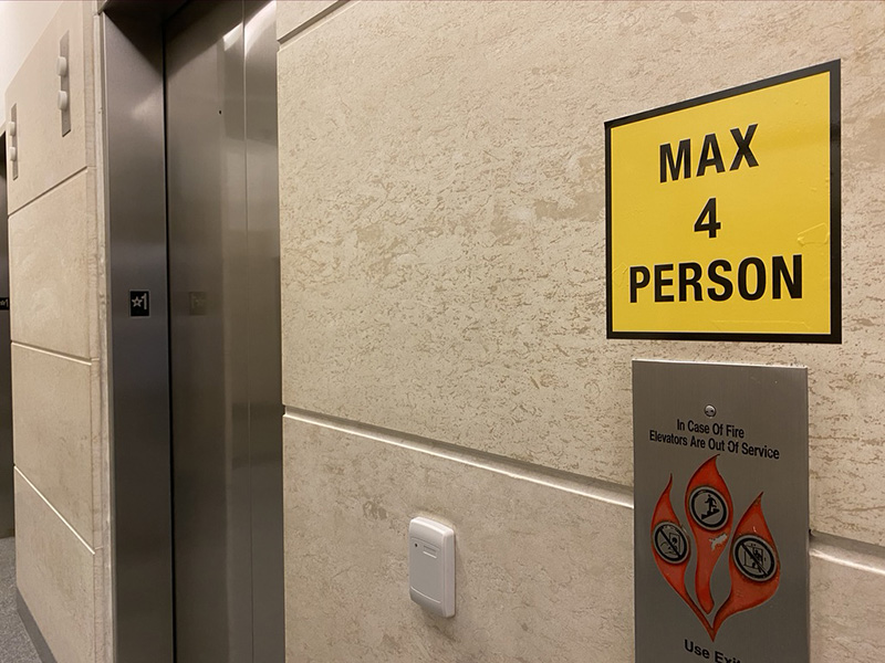 Signs and social distancing markers also have been installed at court elevators to limit the number of passengers per elevator car